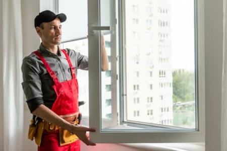 craftsmen-workers-install-a-window-in-the-house-ra-2025-01-10-02-24-23-utc.jpg